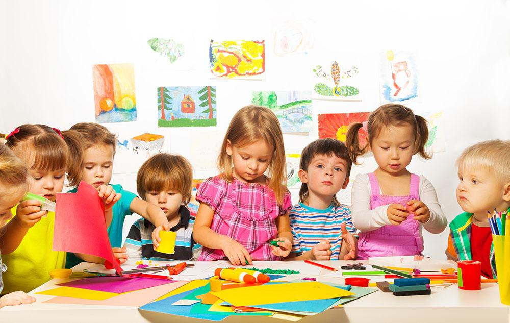 image of young children making art projects